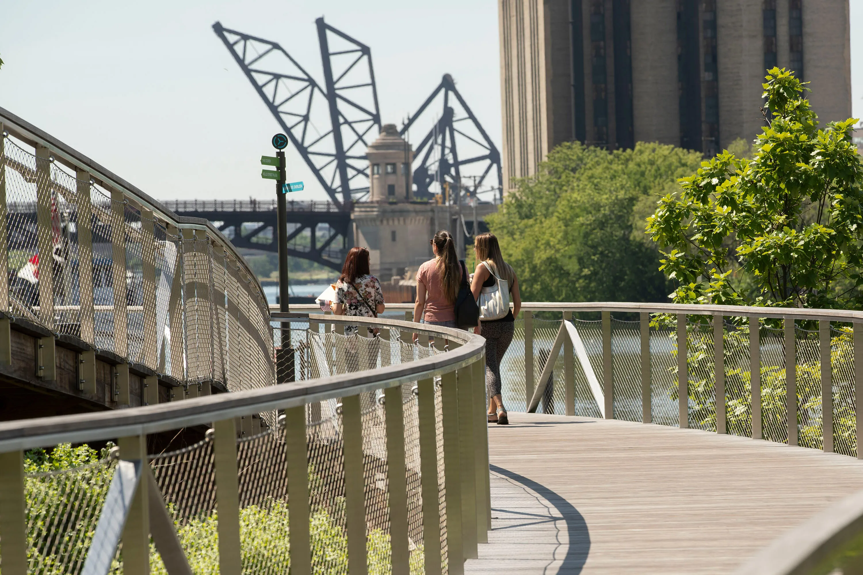 2 B people walking bridge metal southbank park riverline development hoerrschaudt